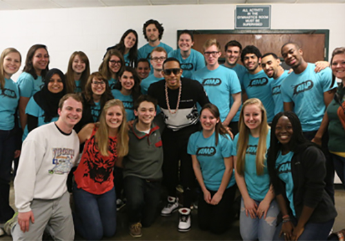 Grammy Award winner Ludacris poses with William & Mary students over Charter Day weekend. The rap artist was on the Williamsburg campus to perform in the school's Charter Day concert.